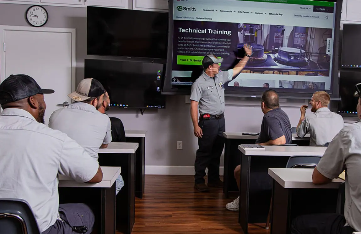 Prime Plumbing technicians in continuing education training